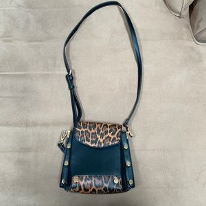 Black and cheetah satchel
